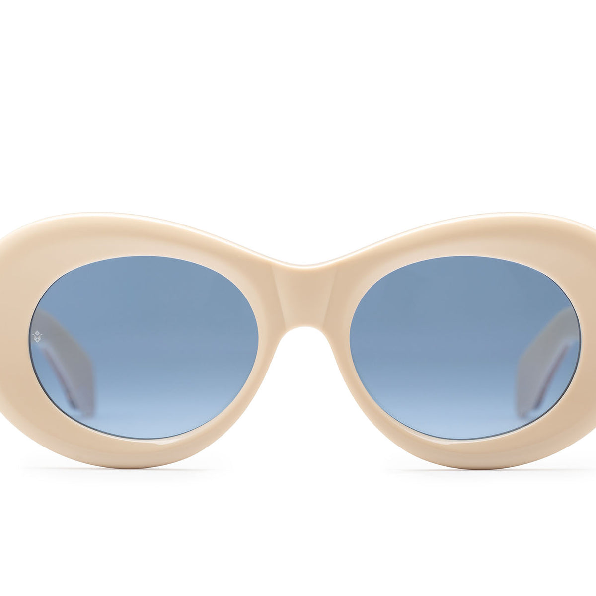 Fortuna cat-eye sunglasses in Milk White with cobalt blue lenses — luxury Italian-made eyewear by J. Goldin, Atlanta.