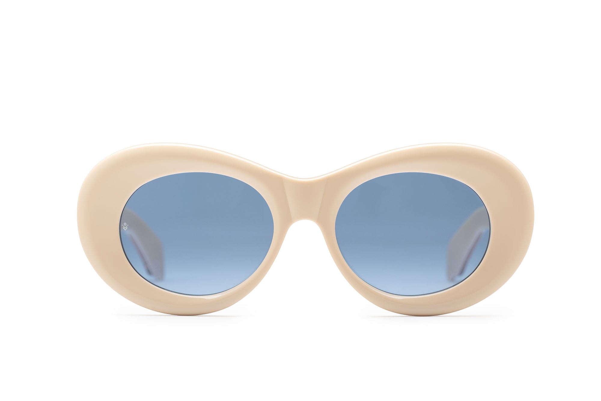 Fortuna cat-eye sunglasses in Milk White with cobalt blue lenses — luxury Italian-made eyewear by J. Goldin, Atlanta.