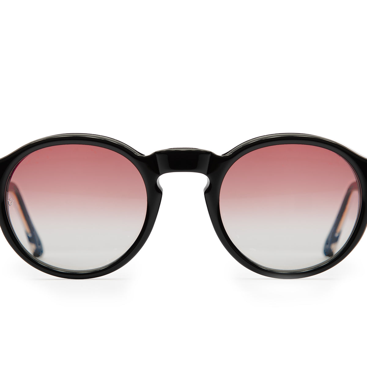 Orpheus round sunglasses in Black with rose lenses — Italian-made luxury eyewear by J. Goldin, designed in Atlanta.